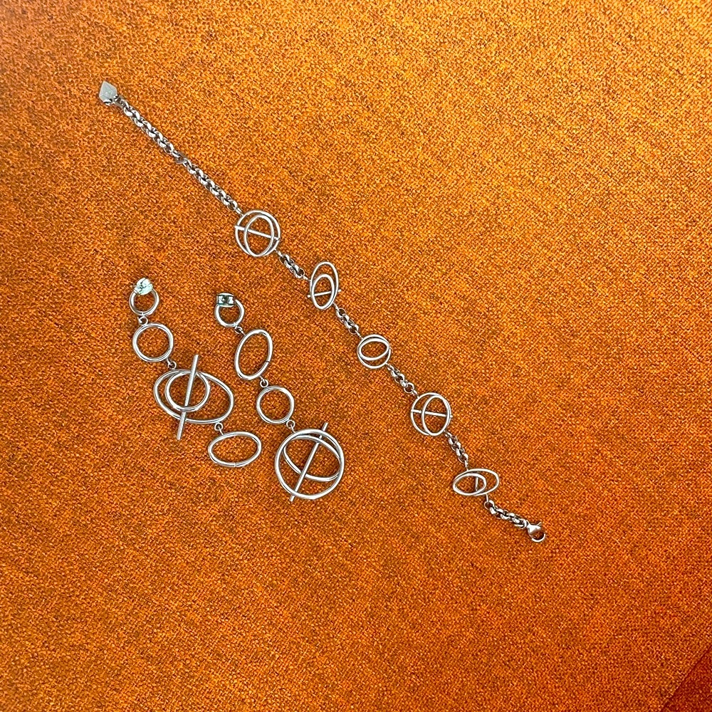 Wanderlust + Co. Steel Set — earrings and bracelet